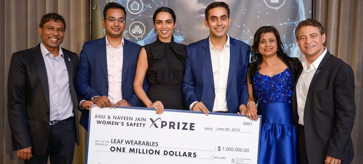 Avinash Bansal and Manik Mehta receiving the $1M Anu and Naveen Jain Women's Safety XPRIZE, June 2018